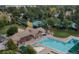 Aerial shot of community pool and clubhouse, featuring an inviting outdoor space at 7844 S Eudora Cir, Centennial, CO 80122