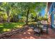Large backyard features mature trees, a patio and a well maintained lawn at 7844 S Eudora Cir, Centennial, CO 80122