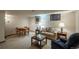 Finished basement space featuring a lounge and game area, perfect for entertaining and relaxing at 7844 S Eudora Cir, Centennial, CO 80122
