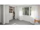 Charming bedroom with a closet with built-ins and natural light from the window with sheer curtains at 7844 S Eudora Cir, Centennial, CO 80122