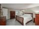 Bedroom with natural light, a large window, and wood furniture at 7844 S Eudora Cir, Centennial, CO 80122