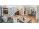 Open living space with hardwood floors, a staircase, and access to the dining area, ideal for entertaining at 7844 S Eudora Cir, Centennial, CO 80122