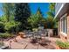 Enjoy outdoor dining on the patio with a built in grill and lots of mature landscape at 7844 S Eudora Cir, Centennial, CO 80122