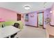 Bright bedroom with pastel walls, wood trim, a built-in desk and a window with a view at 3048 Starling Ct, Castle Rock, CO 80109