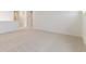 Bright bedroom with neutral carpet, white walls, and ample natural light, creating a cozy and inviting atmosphere at 955 Tallus St, Lochbuie, CO 80603