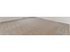Neutral tone carpet with tight weaving on a floor at 955 Tallus St, Lochbuie, CO 80603