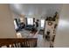 Open living room with a view of the kitchen and entryway at 1621 Flemming Dr, Longmont, CO 80501