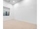 Clean and simple bedroom features neutral carpet and minimalist design at 754 S York St, Denver, CO 80209