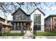 New construction home with a striking facade and manicured front lawn at 754 S York St, Denver, CO 80209