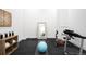 Home gym featuring workout equipment, mirrored wall, and ample space for exercise at 754 S York St, Denver, CO 80209