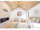 Serene primary bedroom featuring vaulted ceilings, fireplace, and neutral decor at 754 S York St, Denver, CO 80209