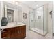 Modern bathroom with a single vanity and a glass shower at 250 Columbine St # 210, Denver, CO 80206