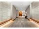 Elegant hallway with modern light fixtures and seating at 250 Columbine St # 210, Denver, CO 80206