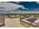 Relaxing rooftop deck with firepit and city views at 250 Columbine St # 210, Denver, CO 80206