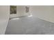 Bright bedroom featuring plush carpeting and ample natural light from two windows at 389 S Kalispell Way # C, Aurora, CO 80017