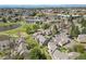 Aerial view of the community, showing landscaping, lake, and surrounding area at 13254 E Asbury Dr, Aurora, CO 80014