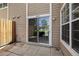 Outdoor patio adjacent to a common green area at 13254 E Asbury Dr, Aurora, CO 80014