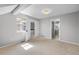 Bright bedroom with neutral carpeting, window, and closet at 13254 E Asbury Dr, Aurora, CO 80014