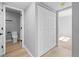 Hallway featuring a closet and entry to the bathroom at 13254 E Asbury Dr, Aurora, CO 80014