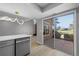 Open floorplan adjacent to an outdoor patio with a golf course view at 13254 E Asbury Dr, Aurora, CO 80014