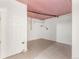 Unfinished basement with tile floor and exposed ceiling at 1636 Geneva St, Aurora, CO 80010
