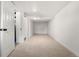 Basement area featuring neutral carpet and plenty of space at 1636 Geneva St, Aurora, CO 80010