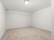 Clean and bright unfinished basement with carpet flooring at 1636 Geneva St, Aurora, CO 80010