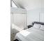 Well-lit bedroom includes a queen bed, storage and a large closet with mirrored sliding doors at 17090 E Ford Dr # 209, Aurora, CO 80017