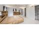 Bright main bedroom features a bed with drawer storage, closet, and dressing area at 26167 De Berry St, Conifer, CO 80433
