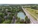 Aerial view of the community tennis courts with lush landscaping at 4 Doral Ln, Littleton, CO 80123