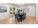 Dining area with modern table and chairs, and ample natural light at 4 Doral Ln, Littleton, CO 80123