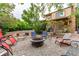 Inviting backyard featuring a fire pit and comfortable seating, perfect for outdoor relaxation at 18206 E Loyola Dr, Aurora, CO 80013