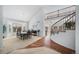 Spacious dining room with hardwood and carpeted floors at 678 Kryptonite Dr, Castle Rock, CO 80108