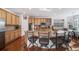 Bright kitchen featuring granite countertops and an island with seating at 678 Kryptonite Dr, Castle Rock, CO 80108