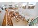 High-ceiling living room with a fireplace and ample natural light at 678 Kryptonite Dr, Castle Rock, CO 80108