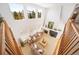 Two-story living room with fireplace and large windows at 678 Kryptonite Dr, Castle Rock, CO 80108