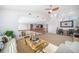 Bright loft features a sitting area, desk space, and wood flooring at 678 Kryptonite Dr, Castle Rock, CO 80108