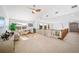 Spacious loft area with sitting area, hardwood floors, and natural light at 678 Kryptonite Dr, Castle Rock, CO 80108