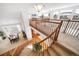 View from upstairs showing the main staircase and views to the lower level at 678 Kryptonite Dr, Castle Rock, CO 80108