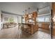 Spacious kitchen with a center island, breakfast bar, and open dining area at 1425 Autumnwood Ln, Evergreen, CO 80439