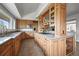 Chef's kitchen featuring custom cabinetry and high-end stainless steel appliances at 1425 Autumnwood Ln, Evergreen, CO 80439