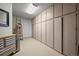 Organized storage room with ample cabinet space and a clean, functional design at 1425 Autumnwood Ln, Evergreen, CO 80439