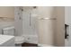 Bright bathroom featuring tiled shower and modern fixtures at 775 S Alton Way # 5B, Denver, CO 80247