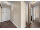 Welcoming hallway with neutral decor and access to other rooms at 775 S Alton Way # 5B, Denver, CO 80247