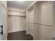 Spacious walk-in closet with custom shelving and ample storage space at 775 S Alton Way # 5B, Denver, CO 80247