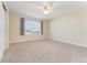 Bedroom featuring neutral walls, carpet and lots of natural light at 23596 E Piccolo Dr, Aurora, CO 80016