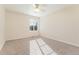 Bedroom featuring neutral walls, carpet and a window with window shades at 23596 E Piccolo Dr, Aurora, CO 80016