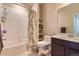 Clean bathroom with shower/tub combo, toilet and vanity at 460 E Fremont Pl # 208, Centennial, CO 80122