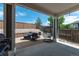 Outdoor patio boasts a hanging chair and dining set creating a relaxing outdoor living space at 2209 Lupine Pl, Erie, CO 80516