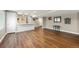 Finished basement with wood floors, bar, recessed lights, and ample space at 2209 Lupine Pl, Erie, CO 80516